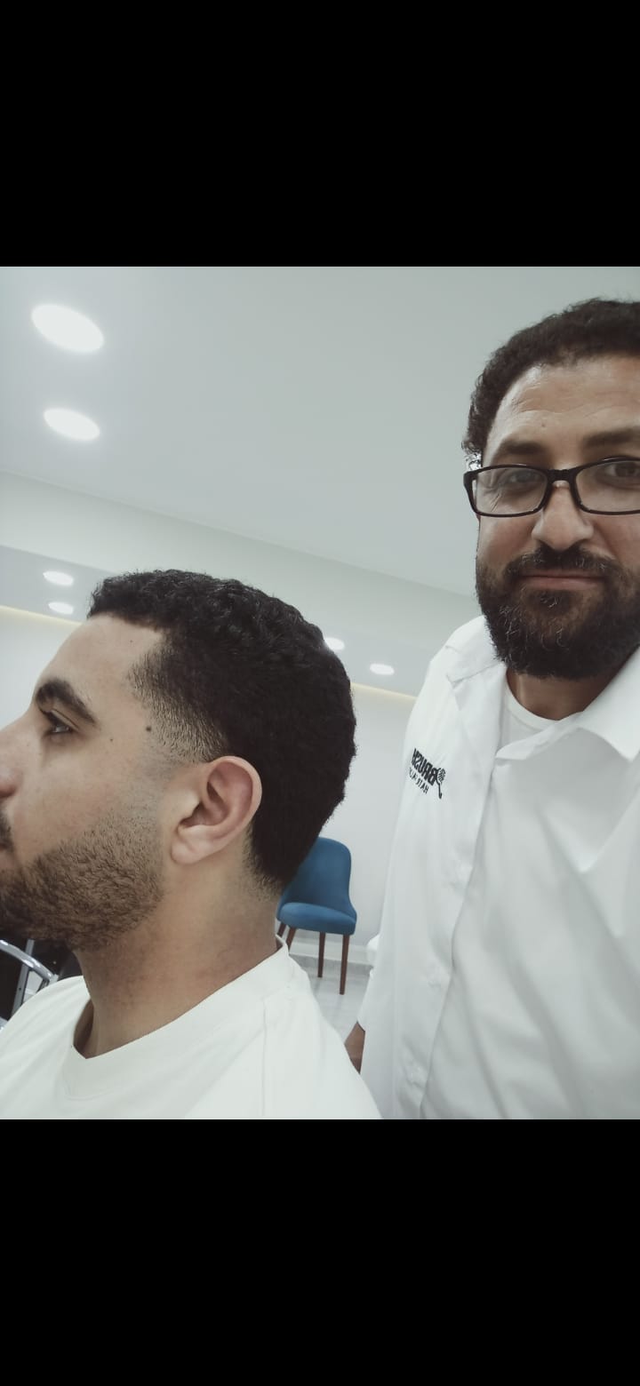 صورة الحلاق